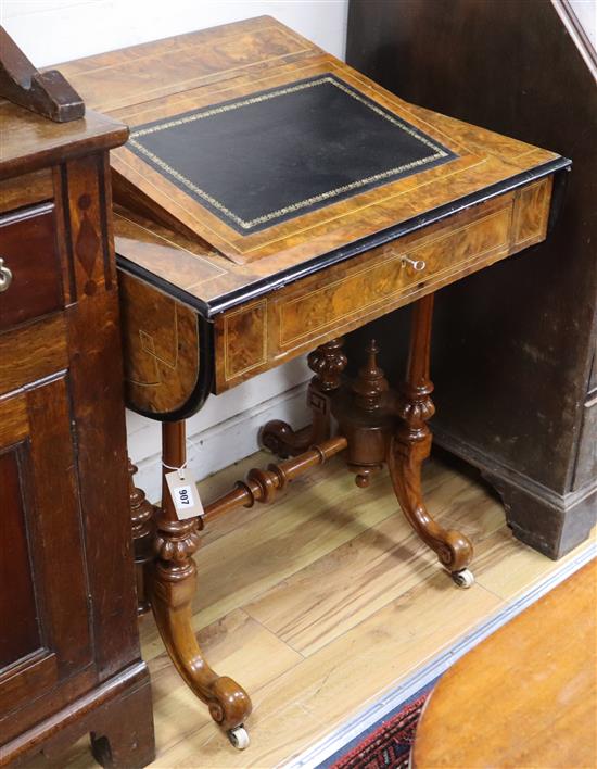 A Victorian burr walnut writing table W.68cm